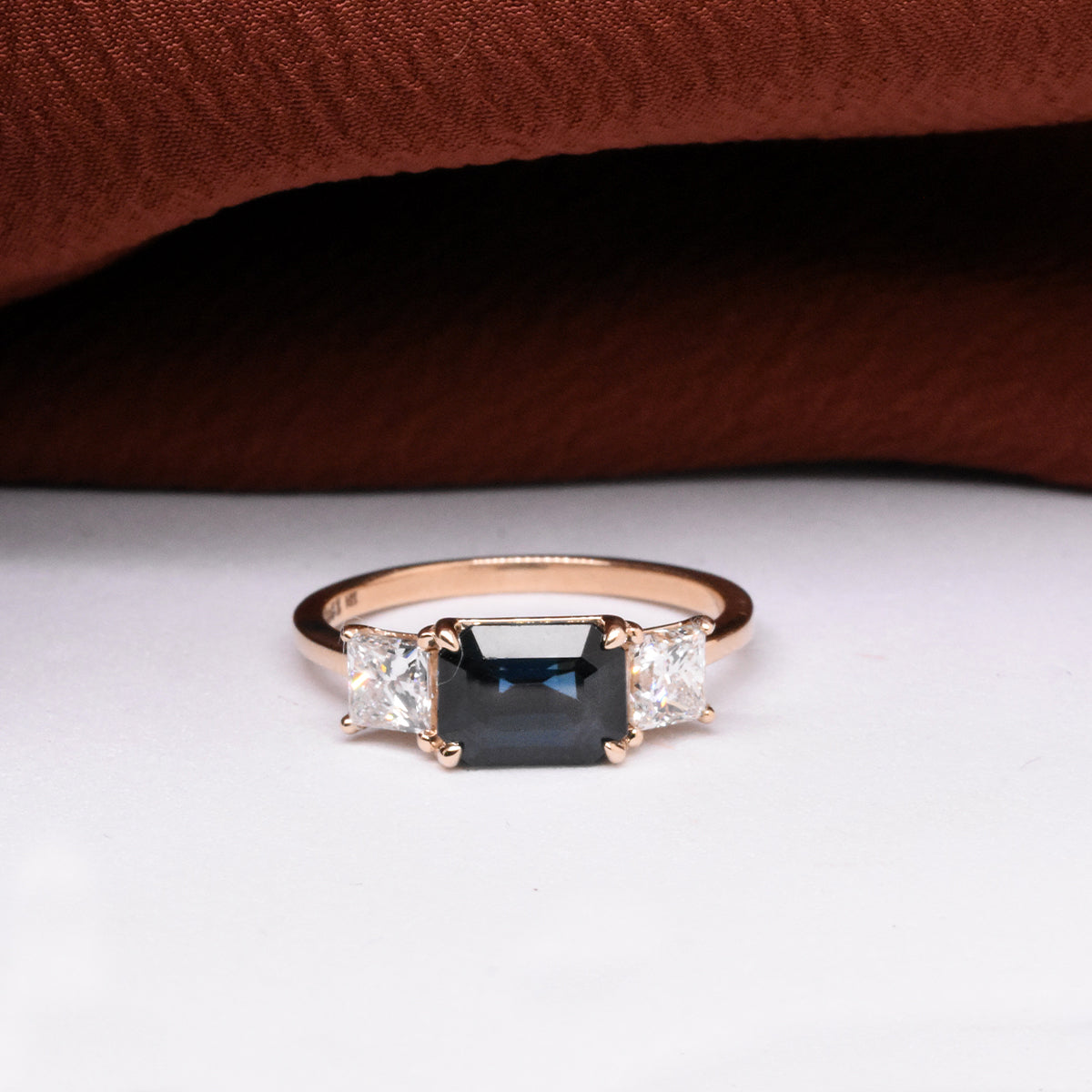 2.04ct East-West Blue Sapphire with Princess-Cut Side Stones