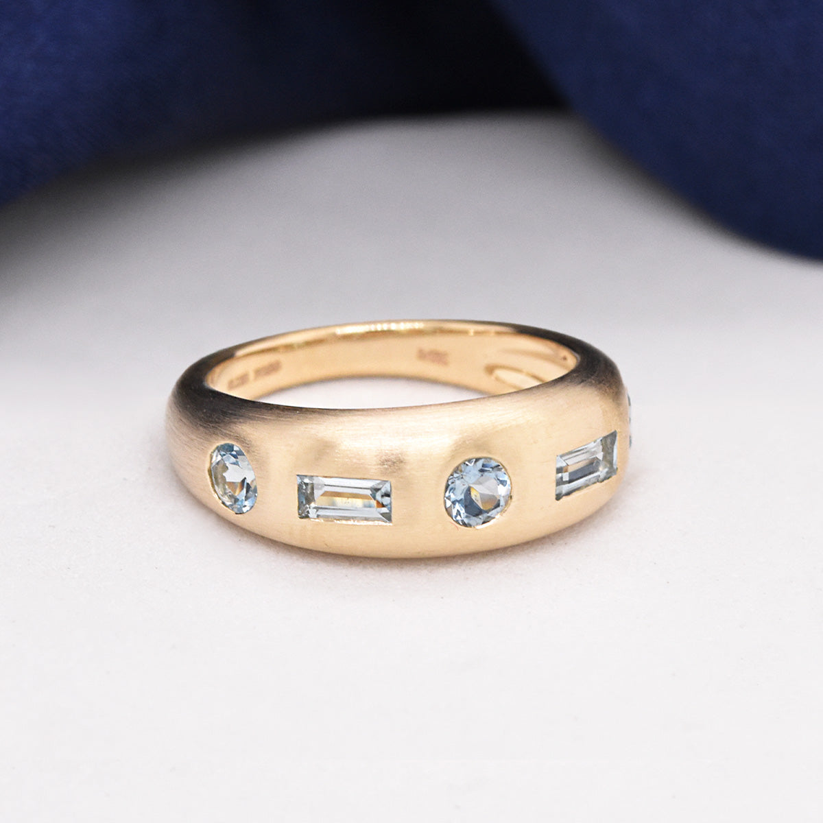 Satin Finish Dome Ring with Alternating Round & Baguette Flush-Set Aquamarine Gemstones