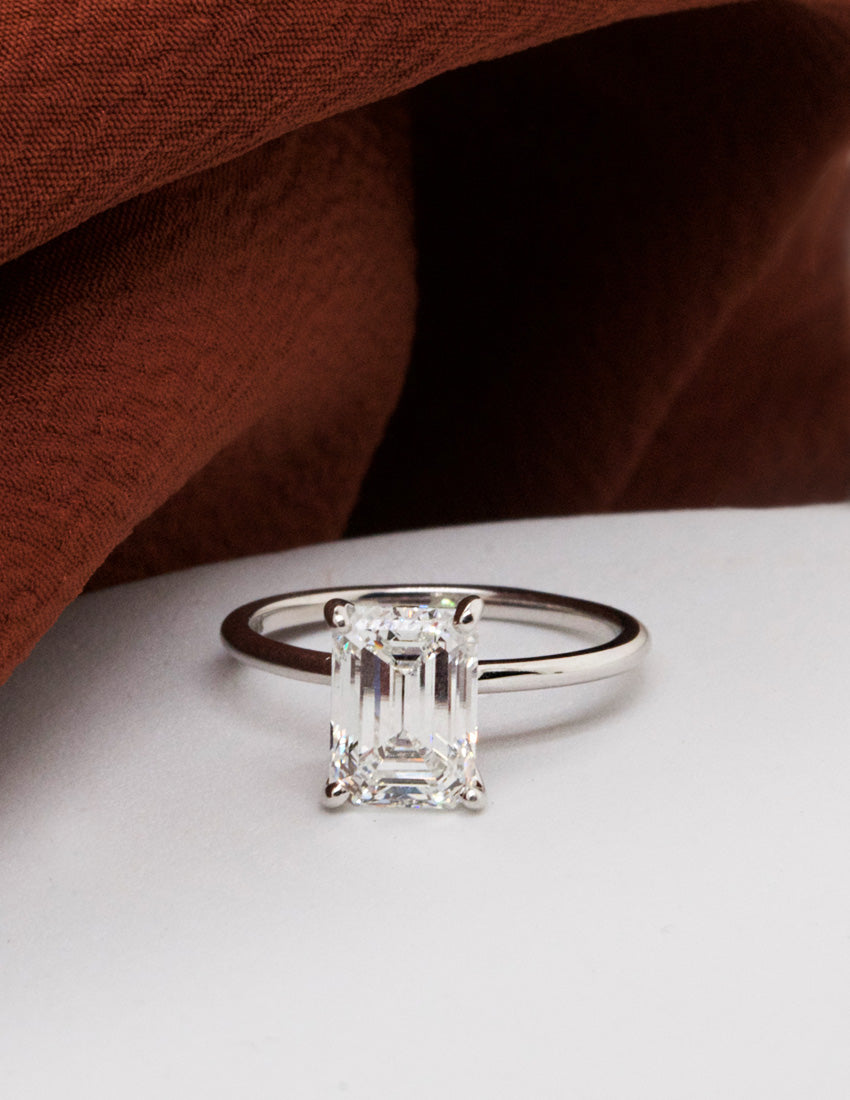 Emerald-Cut White Diamond in a Platinum Solitaire Setting