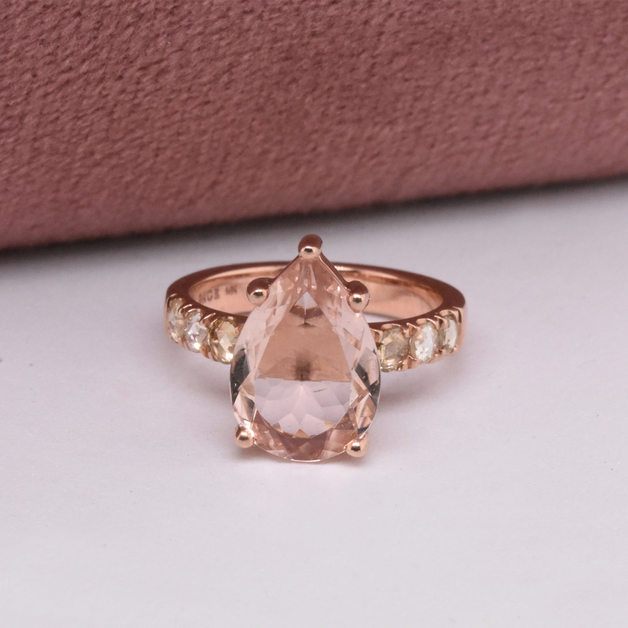 3.52ct Pear Morganite in a 14k Rose Gold Setting with French-Set Champagne Diamonds