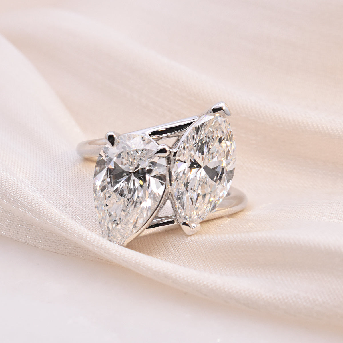 2.34ct Pear & 1.90ct Marquise Lab-Grown Diamonds in an Angled Toi Et Moi Setting in Platinum