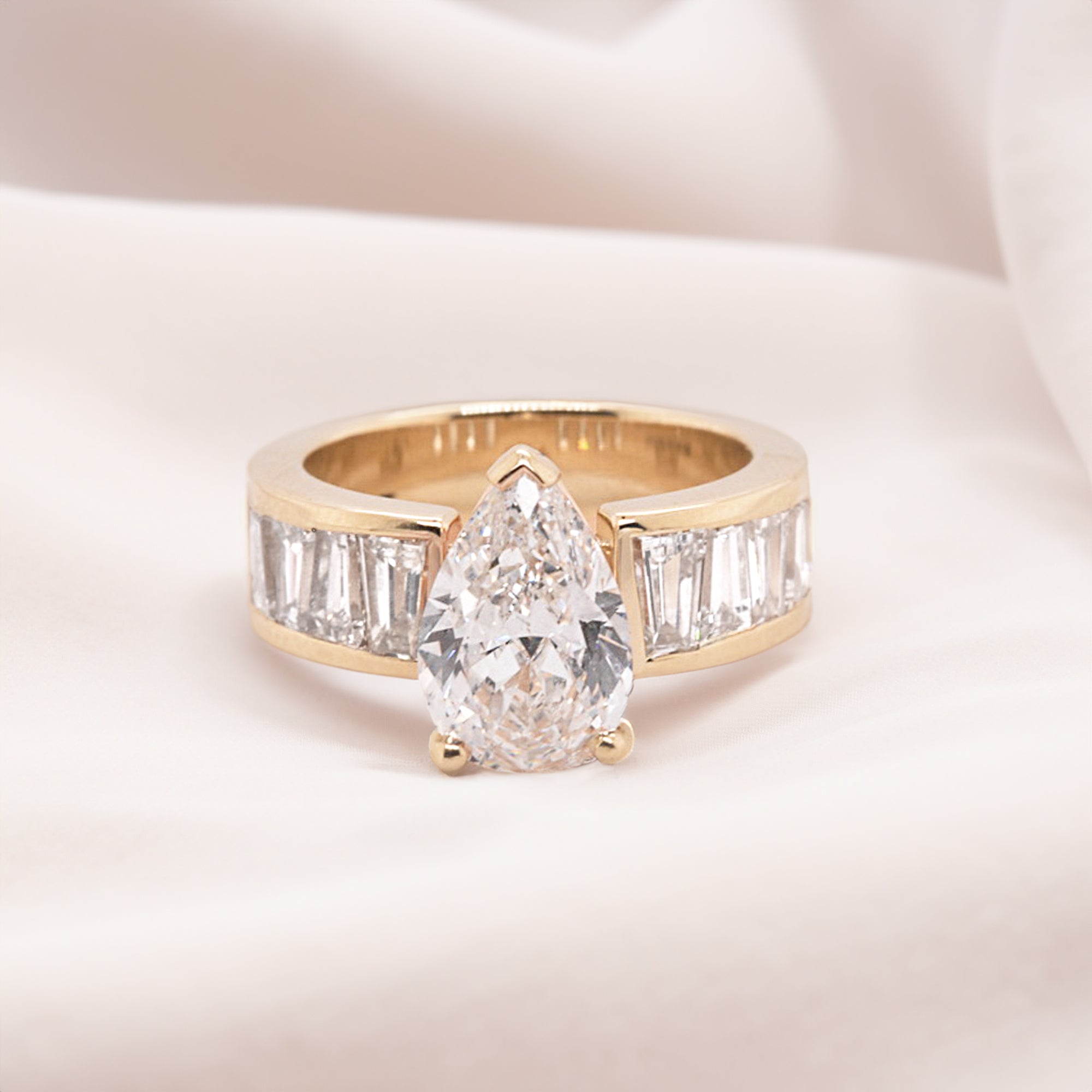 2.19ct Heirloom Pear-Cut White Diamond with Channel Set Graduating Tapered Baguette Diamonds