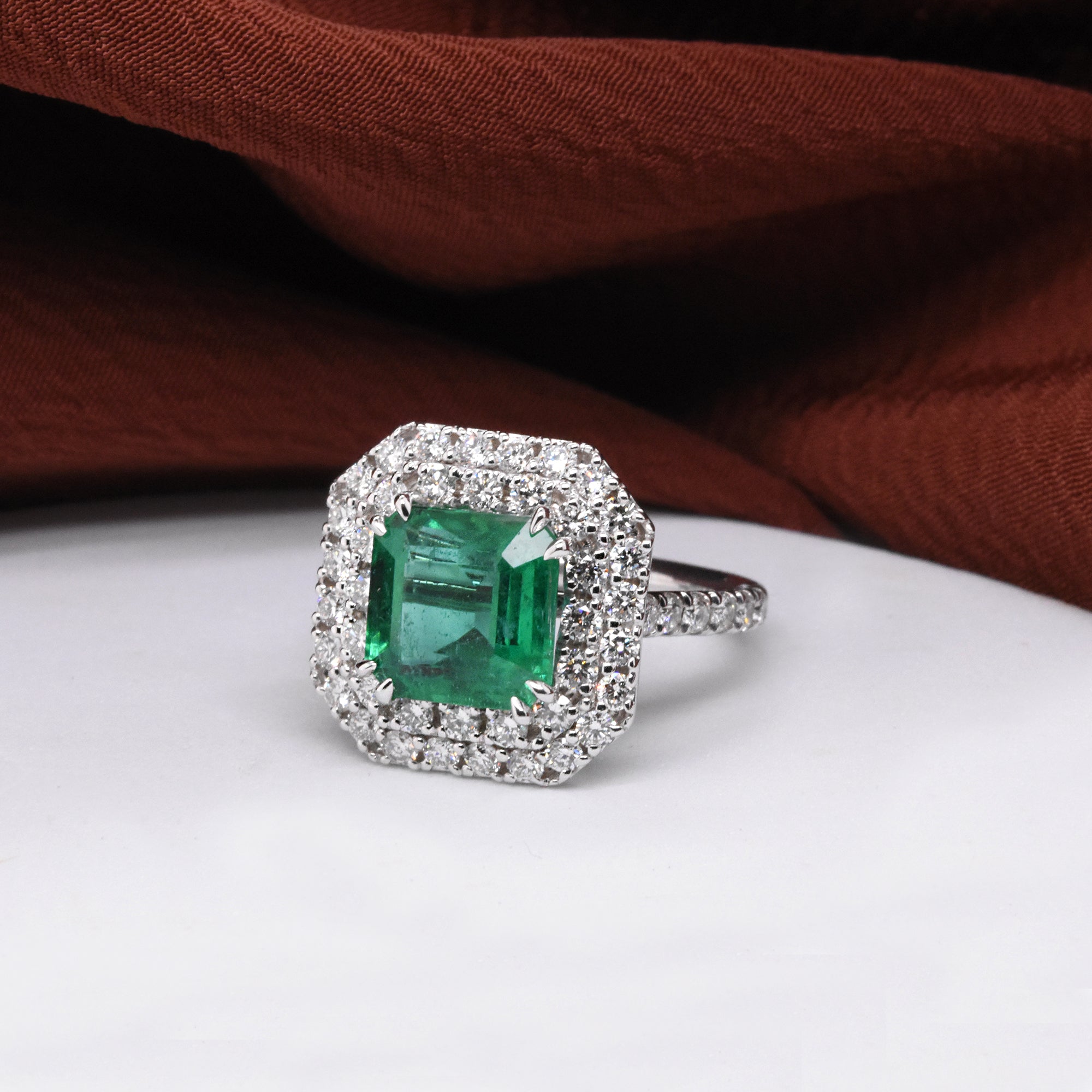 2.83ct Asscher Emerald in a 14k White Gold Double-Diamond Halo Setting