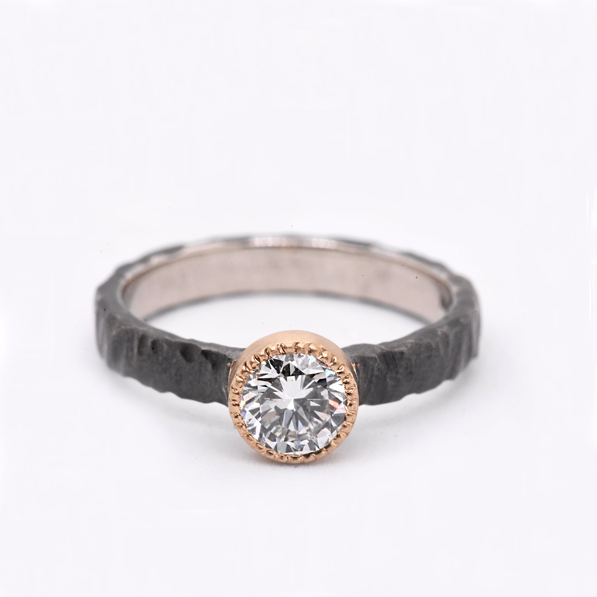 Heirloom Round White Diamond in a Two-Tone 14k Yellow Gold and a Hammered Dark Rhodium Plated 14k White Gold Setting