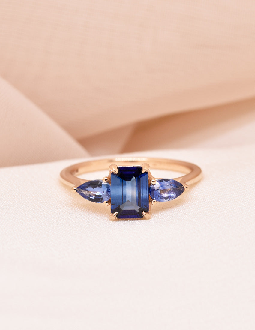0.82ct Emerald-Cut Blue Sapphire with Pear Sapphire Side Stones in 14k Yellow Gold