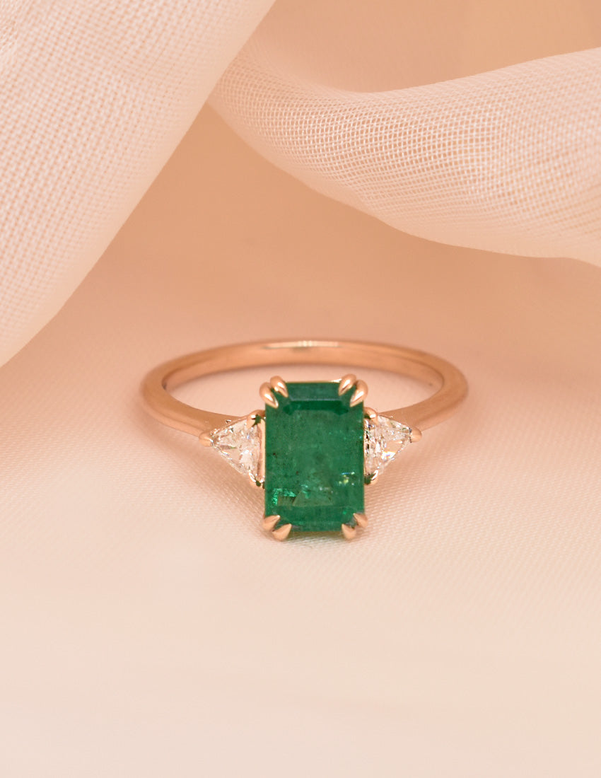 2.05ct Emerald with Double Claw Prongs and Trillion White Diamond Side Stones in 14k Yellow Gold