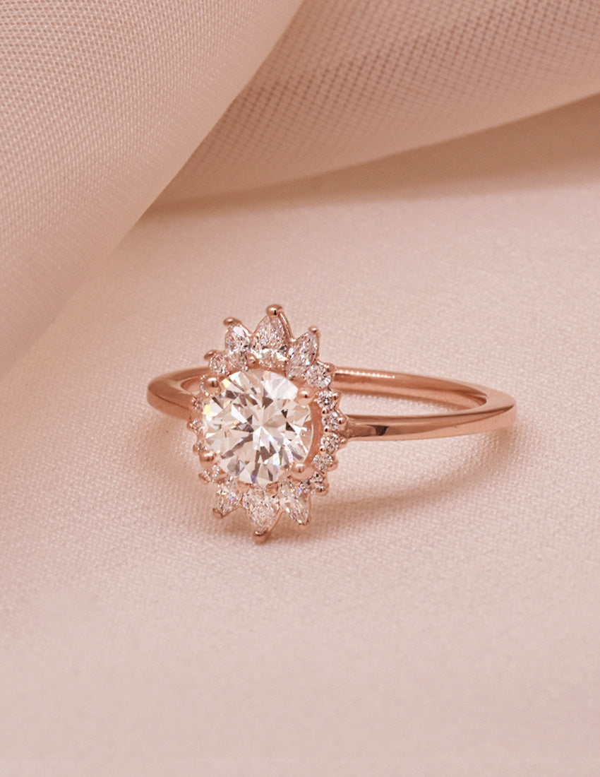 Heirloom Round White Diamond Featuring a Graduated Pear, Marquise, and Round Diamond Halo in 14k Rose Gold