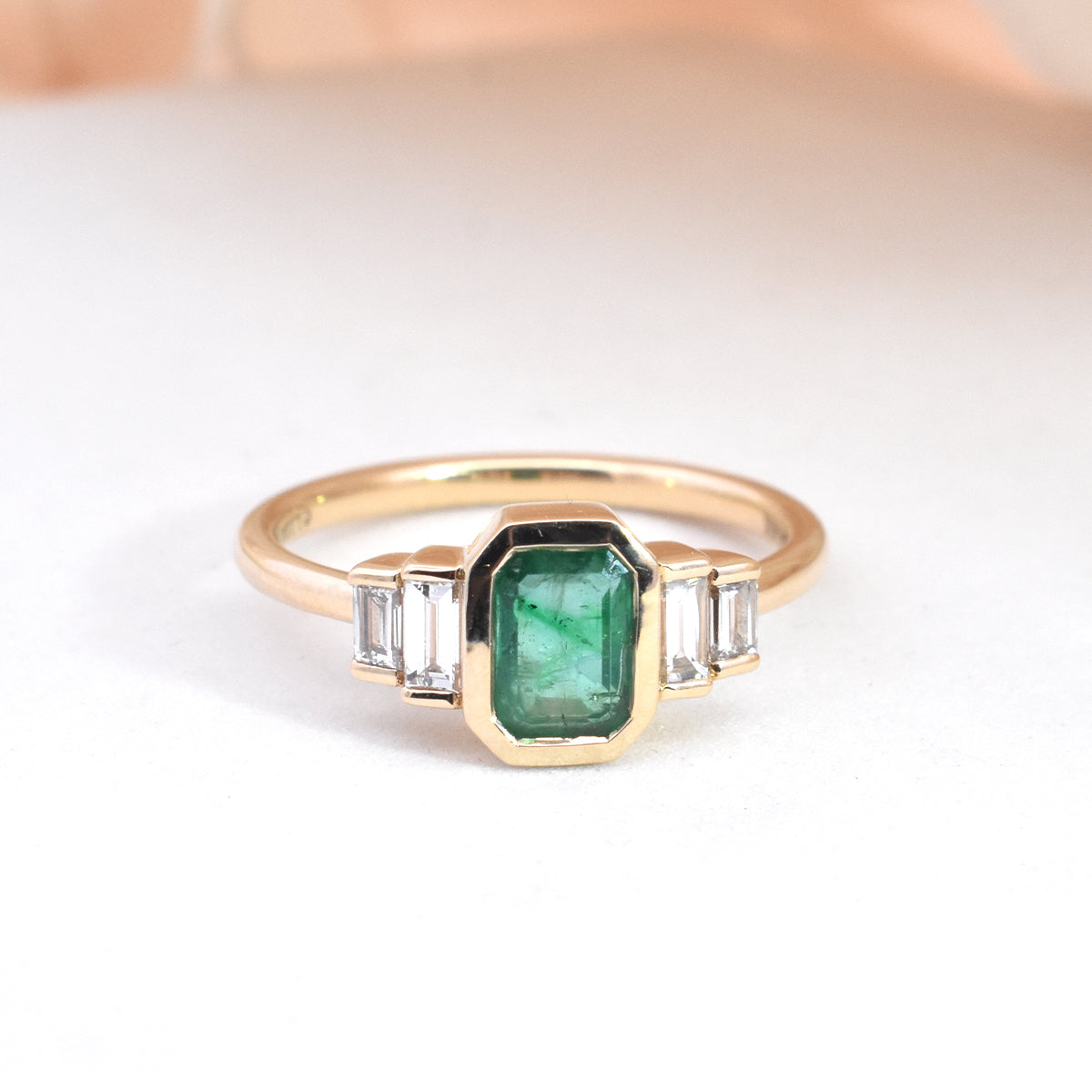 1.03ct Bezel Set Emerald-Cut Emerald with Lab Grown Diamond Baguette Side Stones in EP Elliot Setting