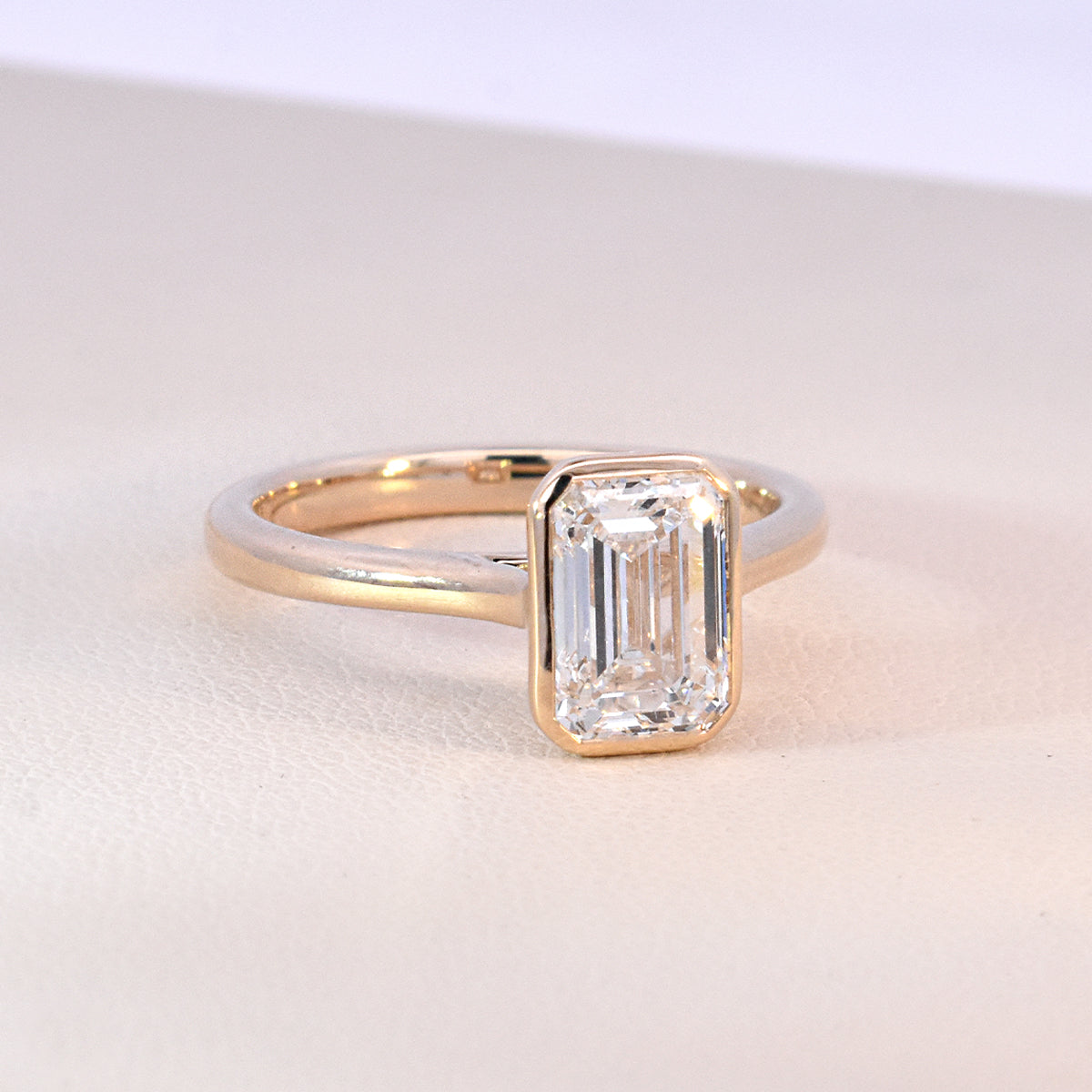 1.85ct Lab-Grown Emerald-Cut Diamond Bezel Set in a Cathedral Ring Shank Setting