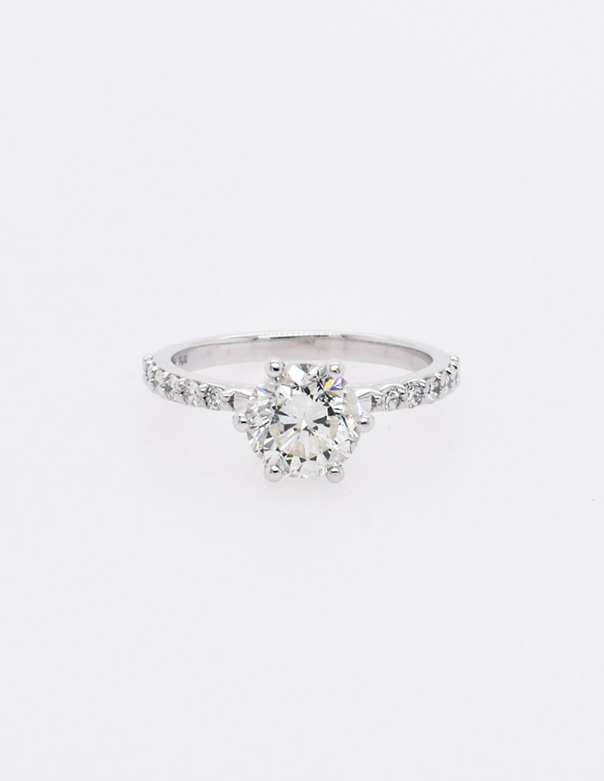 Heirloom Round White Diamond in a 6-Prong Half-Eternity Setting in Platinum