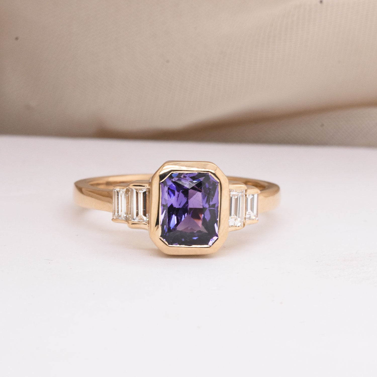 1.75ct Emerald-Cut Purple Sapphire in The Elliot Setting