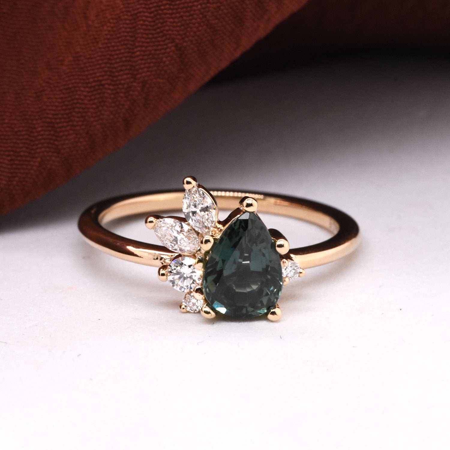 1.05ct Teal Pear Sapphire with Lab-Grown Diamond Accents