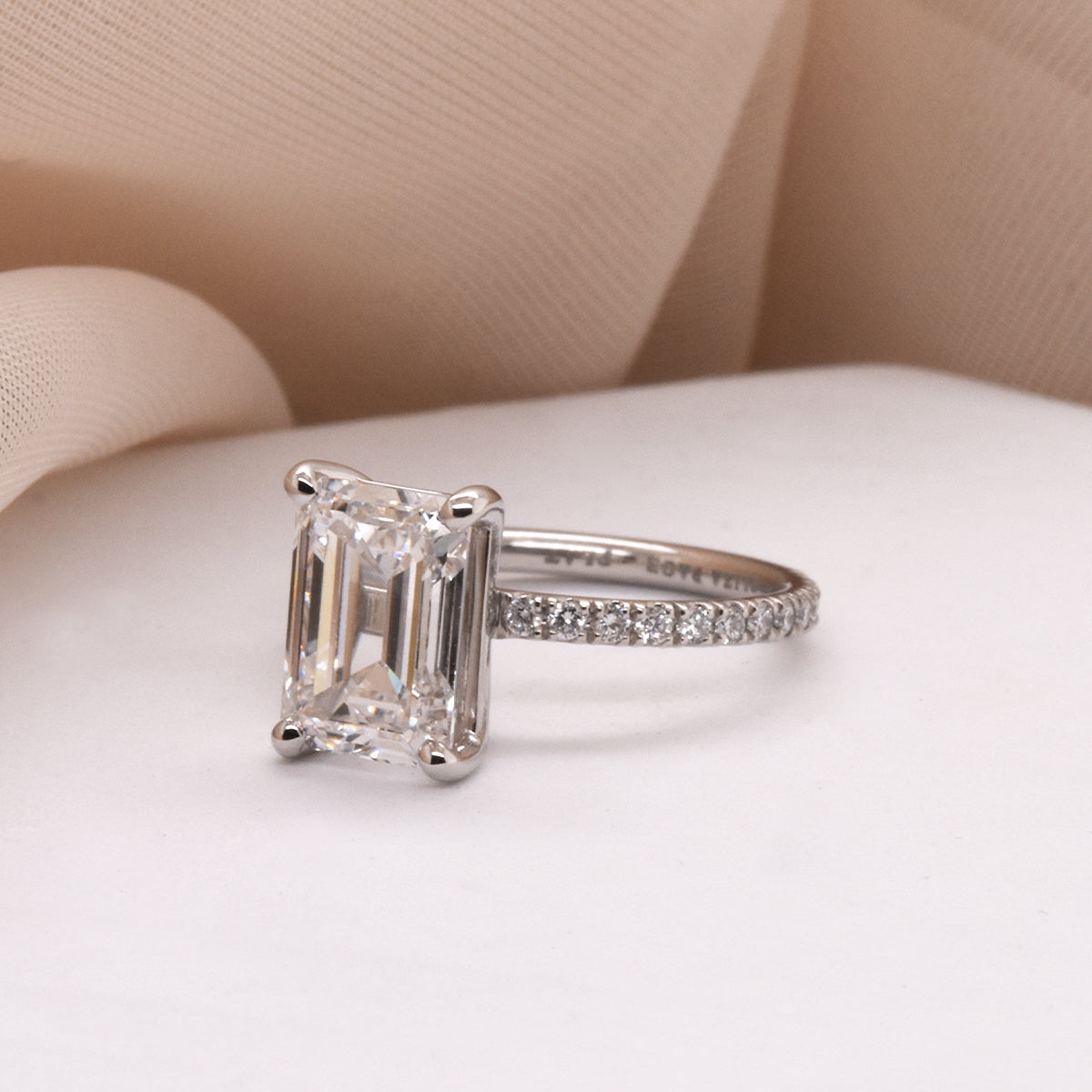 Emerald-Cut White Diamond in a Pave Diamond Band