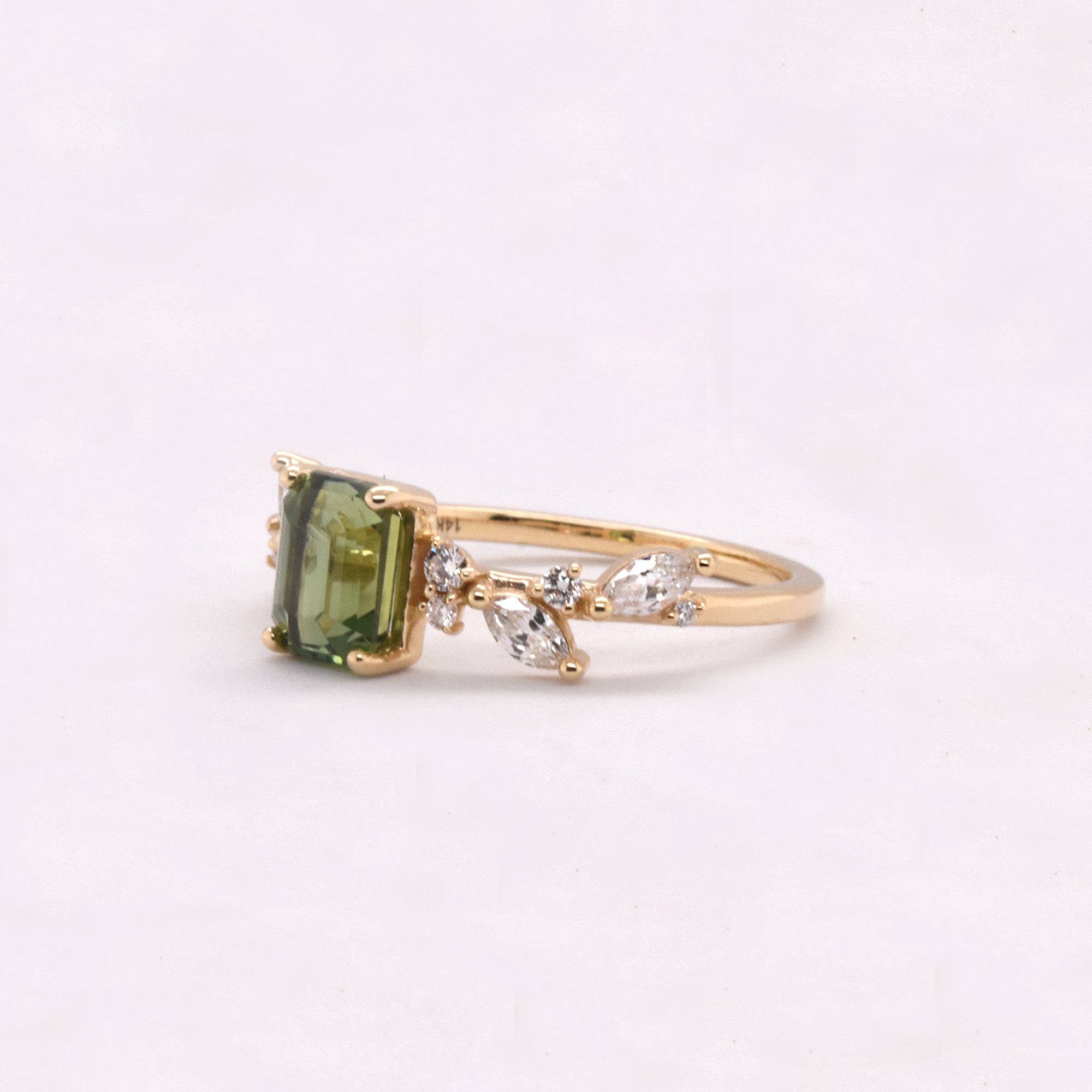 1.57ct Emerald-Cut Green Sapphire in a 14k Yellow Gold Floral Inspired Setting with Diamond Accents