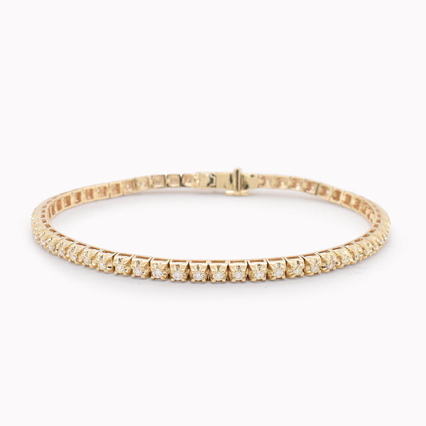 Yellow Gold Illusion Riviere Tennis Bracelet