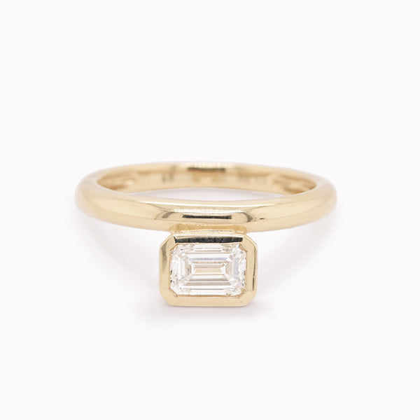 Offset Emerald-Cut Diamond Ring