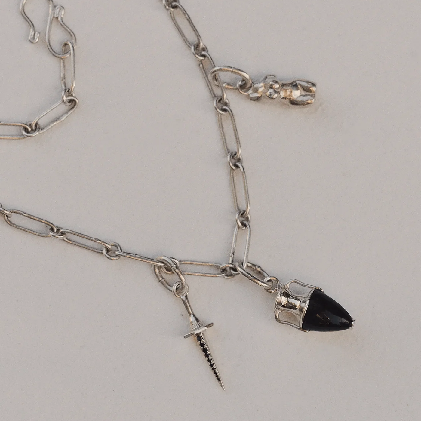 Silver Charm Bail