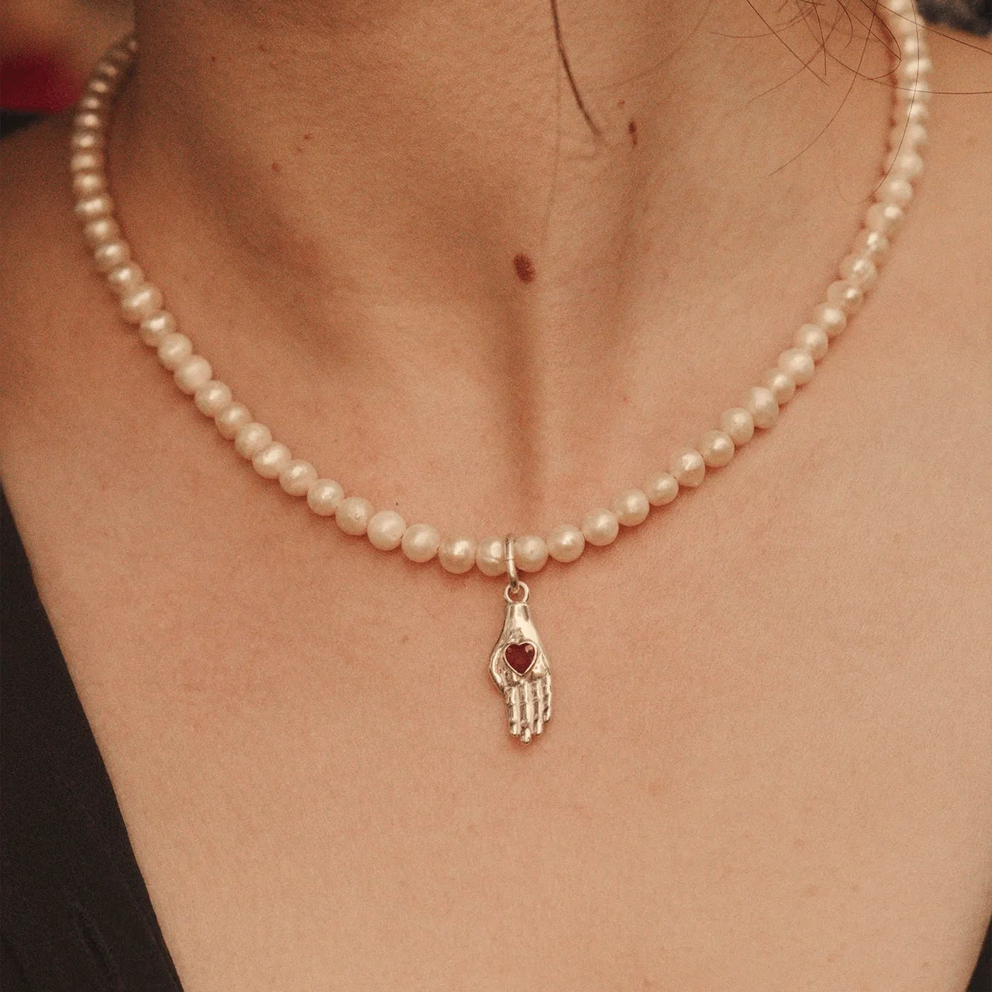 Ruby Hand in Heart Charm